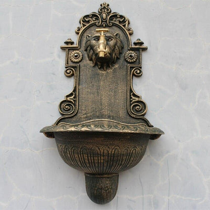 Fontaine murale tête de lion