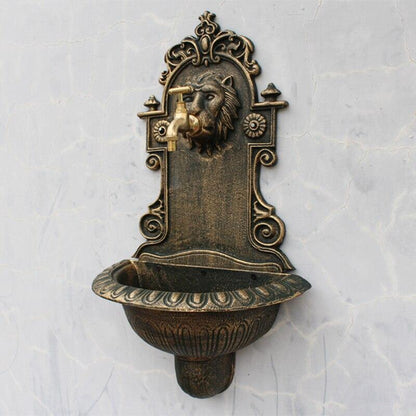 Fontaine murale tête de lion