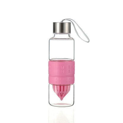 Bouteille en verre presse agrume rose
