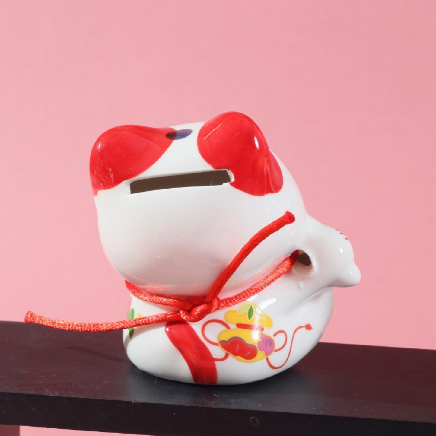Maneki neko patte droite levée