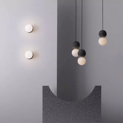 Suspension Origo – Design Géométrique en Pierre Volcanique et Diffuseur en Verre Opale