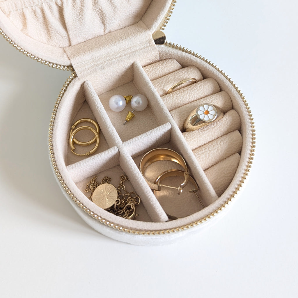 Petite trousse à bijoux ronde en velours