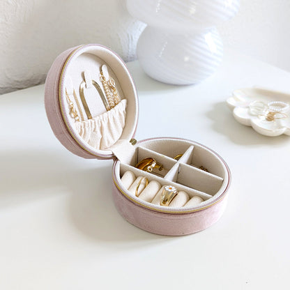 Petite trousse à bijoux ronde en velours
