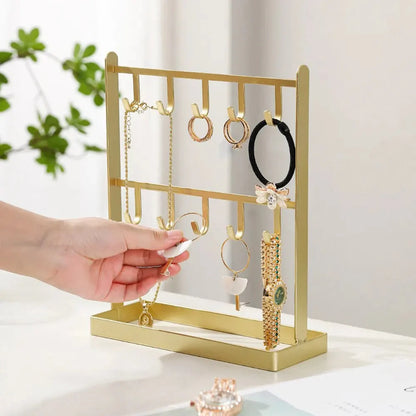Porte bijoux en métal doré ou noir