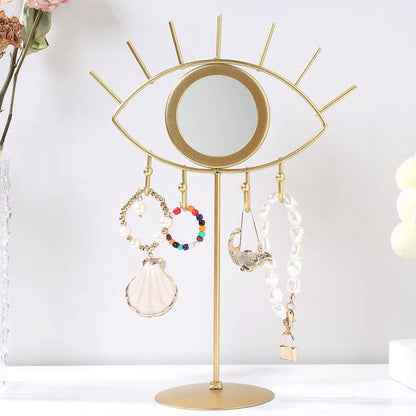 Porte-bijoux oeil et miroir en métal doré