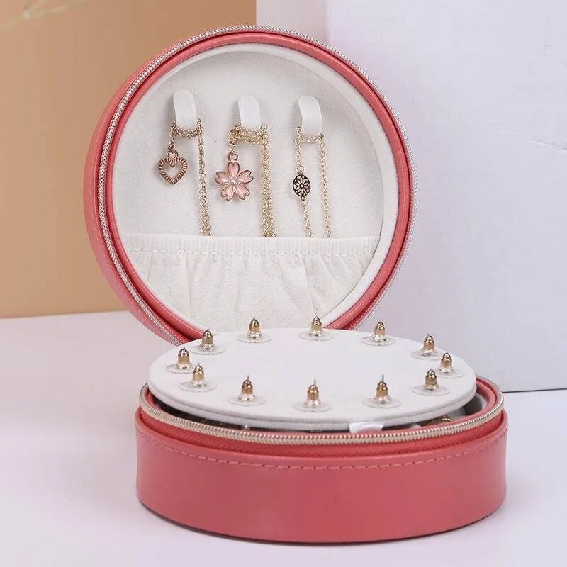 Trousse à bijoux de voyage en cuir ronde