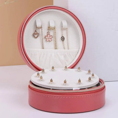 Trousse à bijoux de voyage en cuir ronde