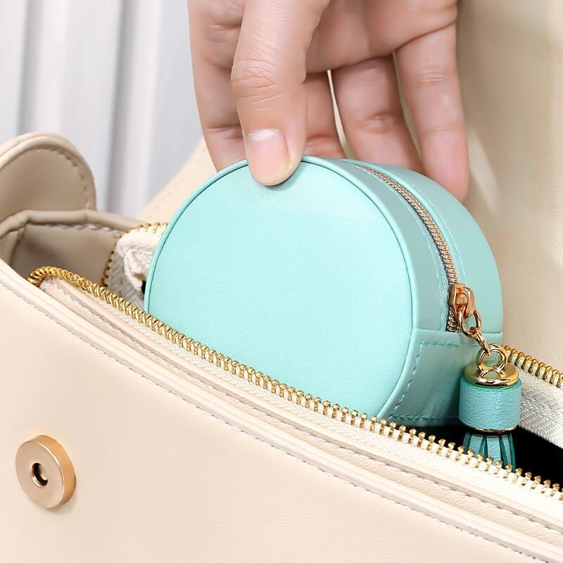 Trousse à bijoux de voyage ronde